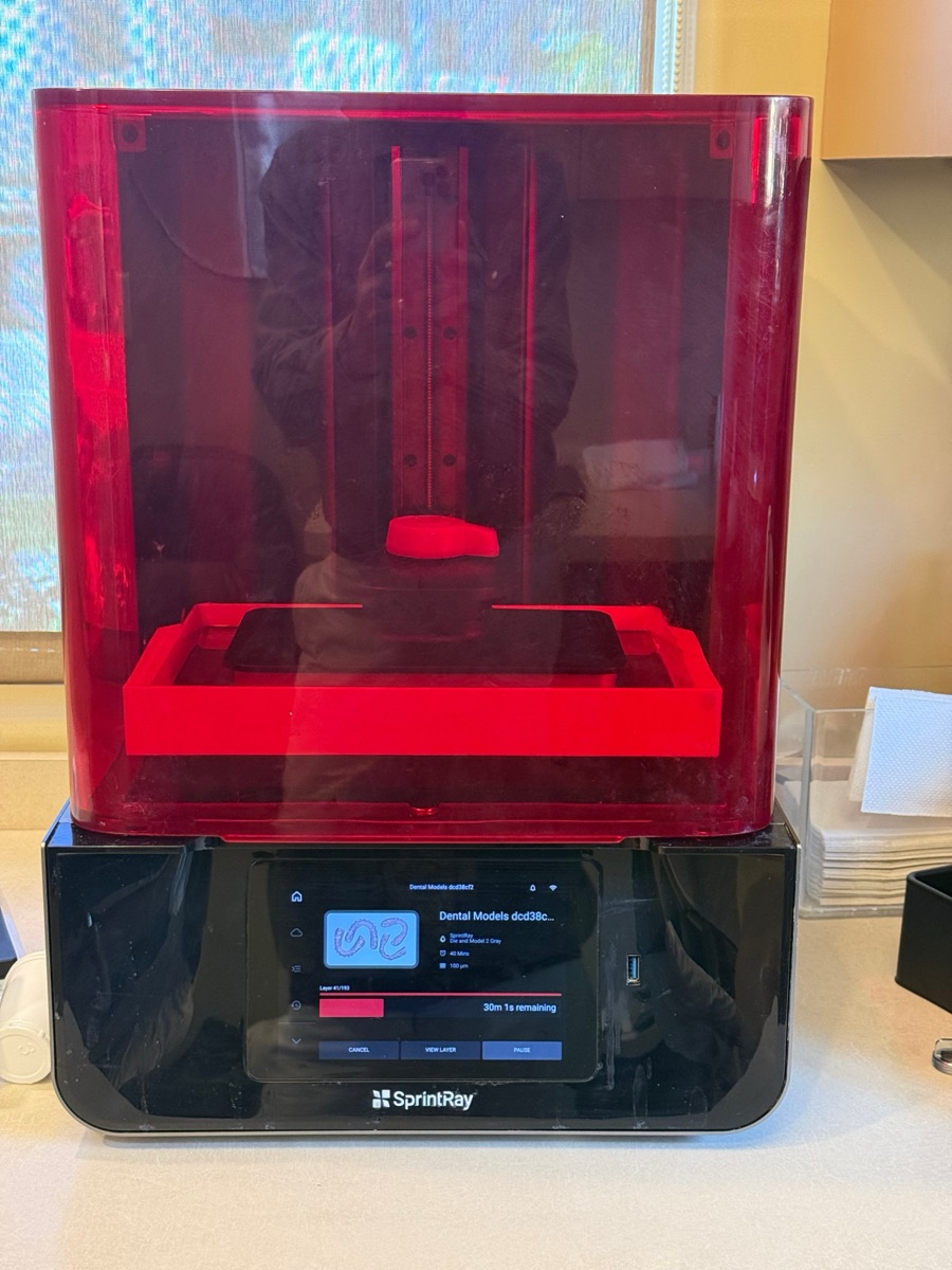 SprintRay Pro 95 3D printer in the office, printing a set of dental models